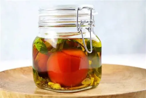 Put tomatoes in oil